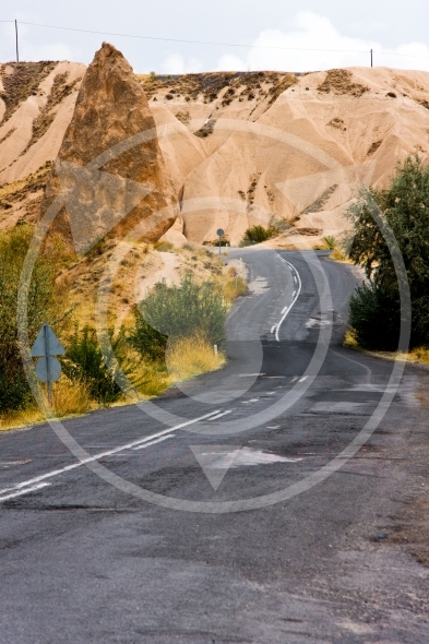 Winding road between the hills of Cappadocia
